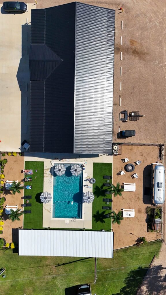 Aerial view of the clubhouse and pool at Magnolia RV Resort