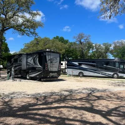 Class A motorhomes parked at Magnolia RV Resort in Waco