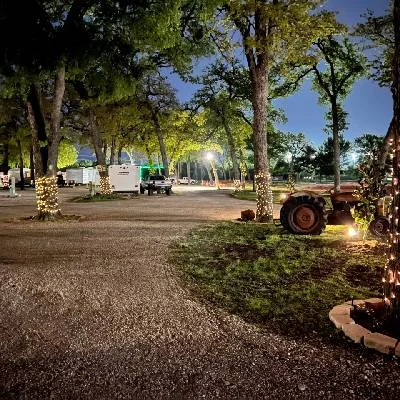 Park road and RV sites at dusk at Magnolia RV Resort in Waco