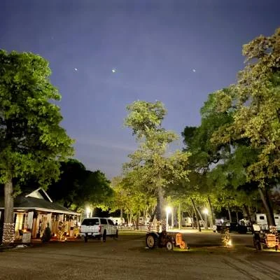 RV sites under the night sky at Magnolia RV Resort in Waco