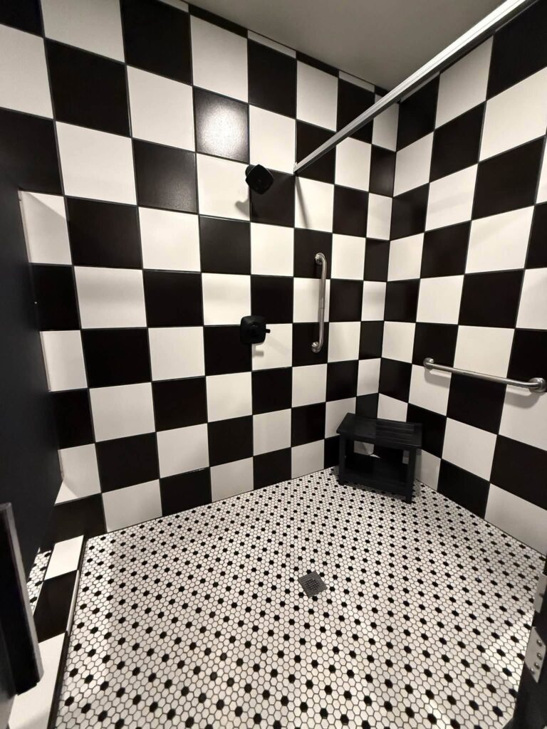 Tiled shower room at Magnolia RV Resort